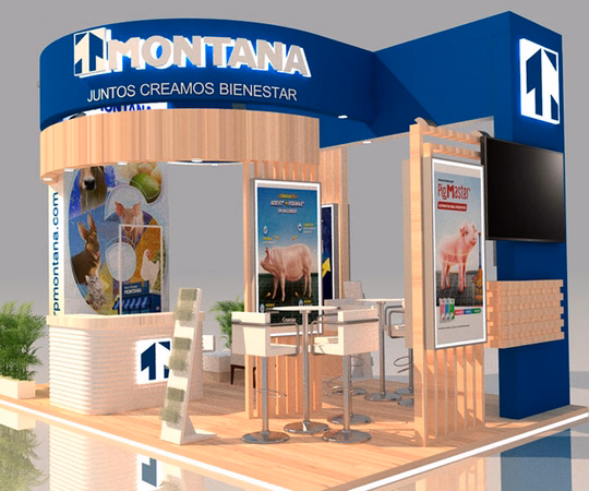 Stand de feria para Montana, con imágenes de cerdos, carteles y zona para sentarse, con el eslogan "Juntos Creamos Bienestar" sobre una estructura azul con acentos de madera.
